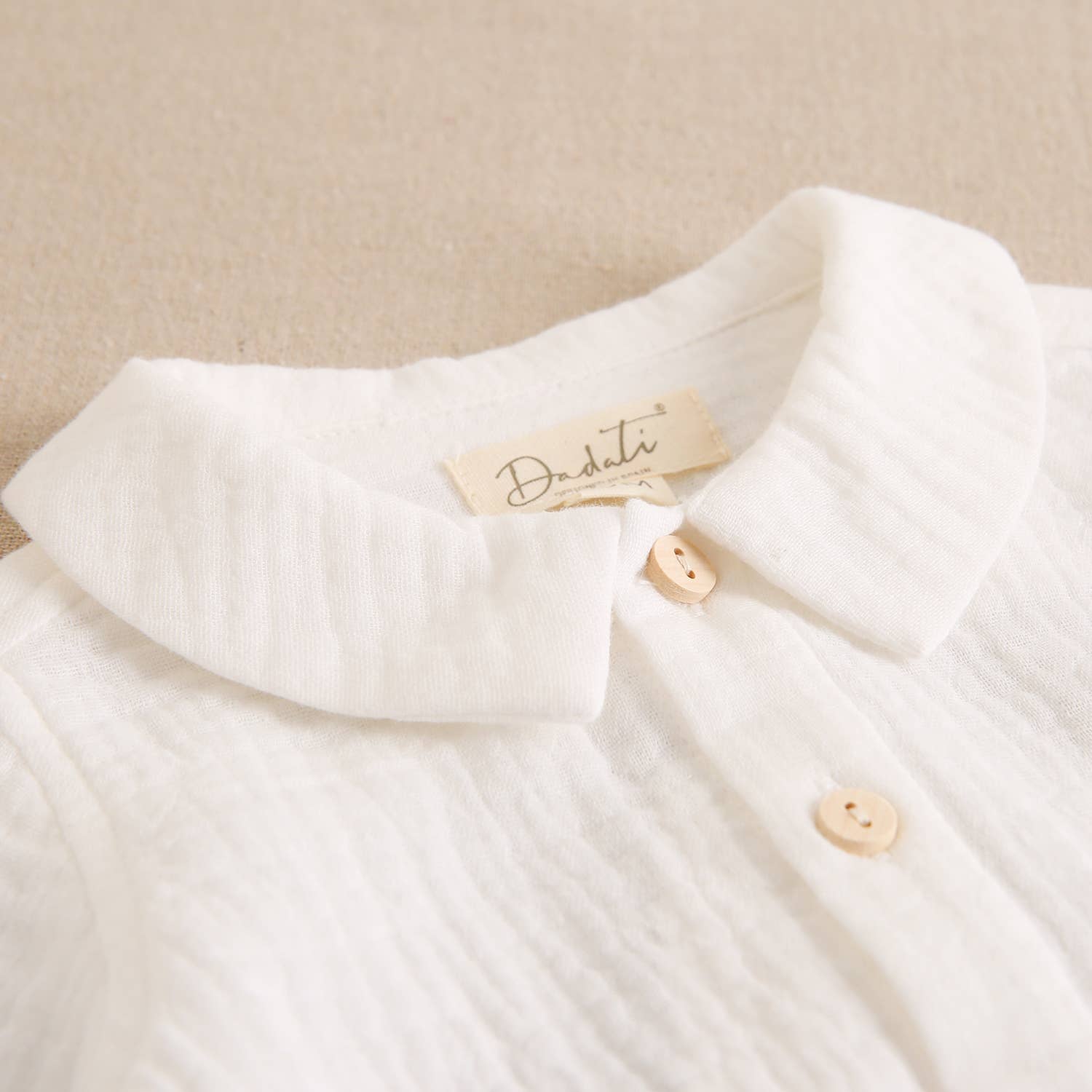 Maglia bianca a maniche lunghe per neonato con colletto baby | Dadati